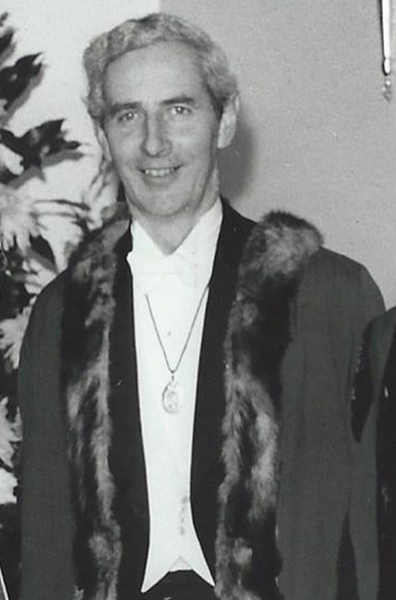 Sir John Julius Wells MA, MP